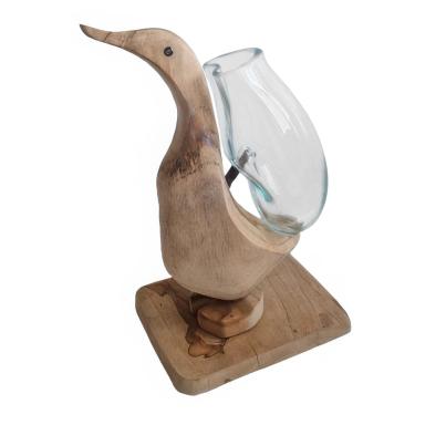 Ente Teak mit Glas auf Rücken