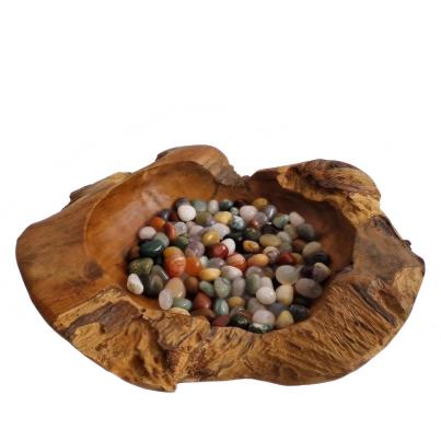 Teakschale mit Trommelsteinen