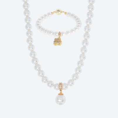 SET: Collier+Armband mit Anhänger Muschelkernperle