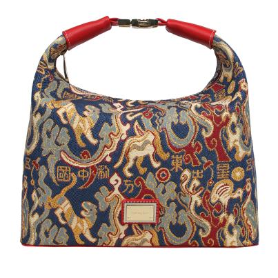 Henney Bear Umhängetasche rot/gemustert