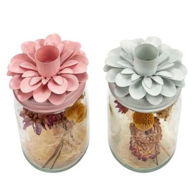 2 Kerzenhalter mit Blumen