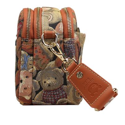 Henney Bear Umhängetasche cognac/multicolor